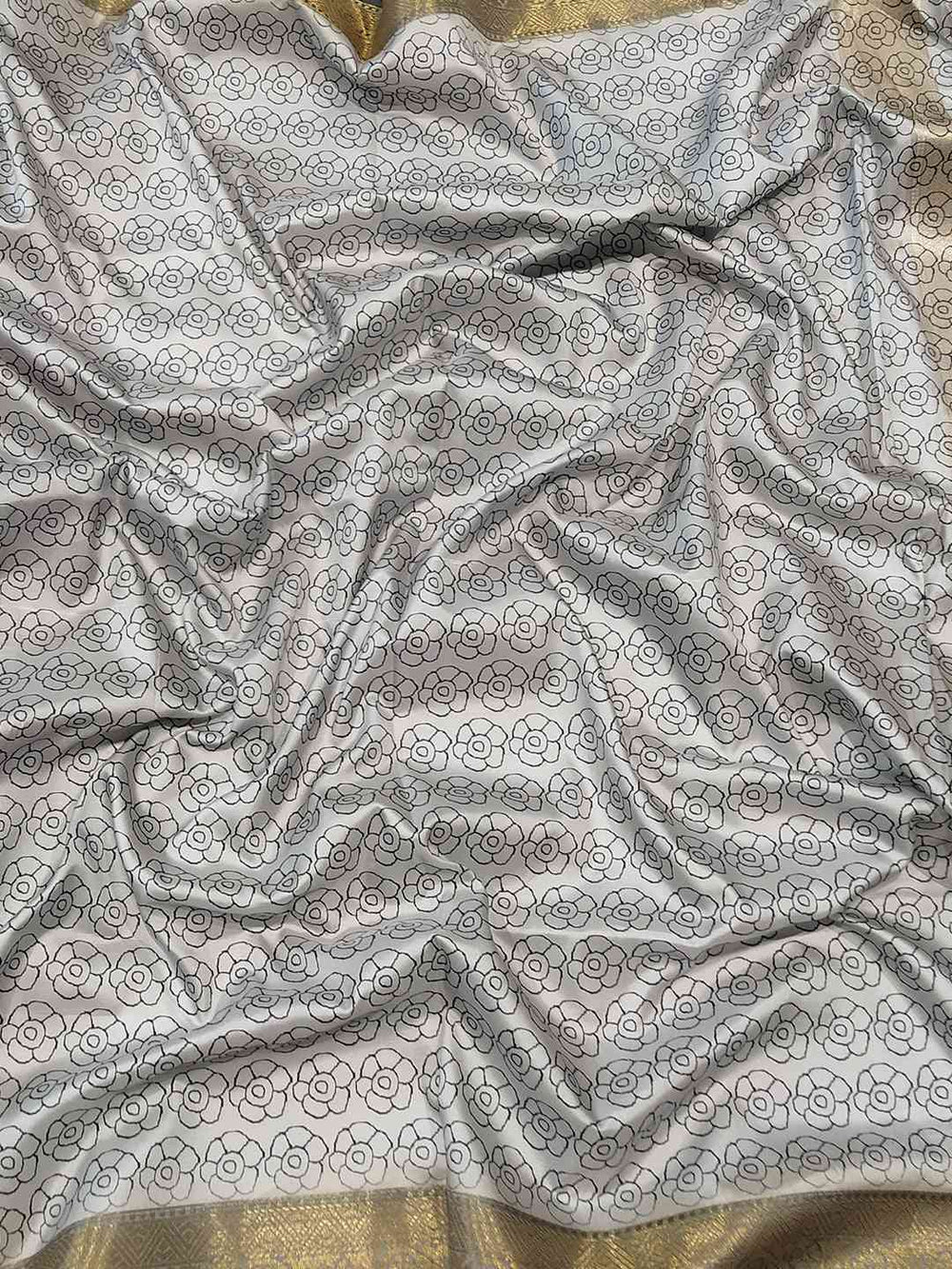 Fabric detail of Kalamkari saree with floral block print