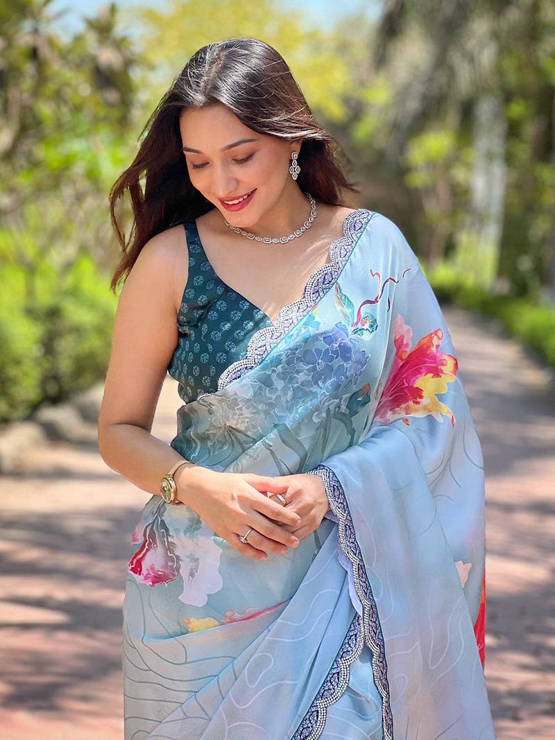 Light blue satin georgette floral print saree, outdoor setting