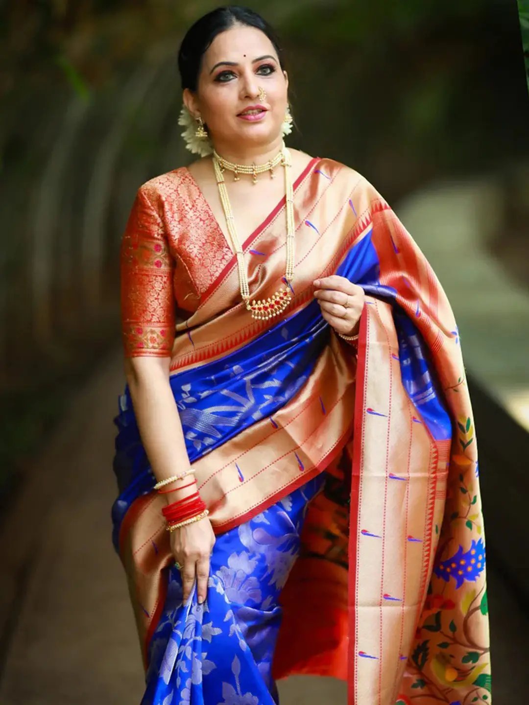 Royal blue Paithani silk saree with intricate pichwai design