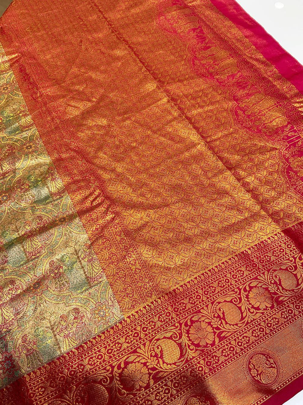 Vibrant Dharmavaram silk saree with ornate gold designs