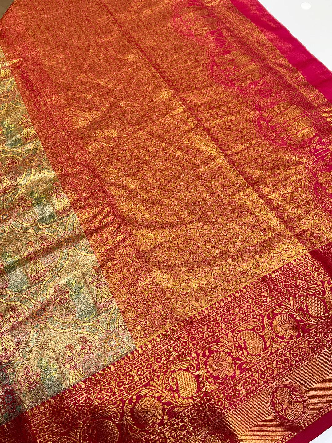 Vibrant Dharmavaram silk saree with ornate gold designs