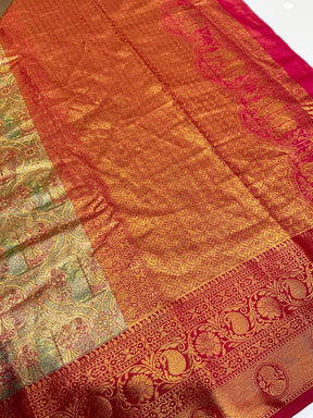 Vibrant Dharmavaram silk saree with ornate gold designs