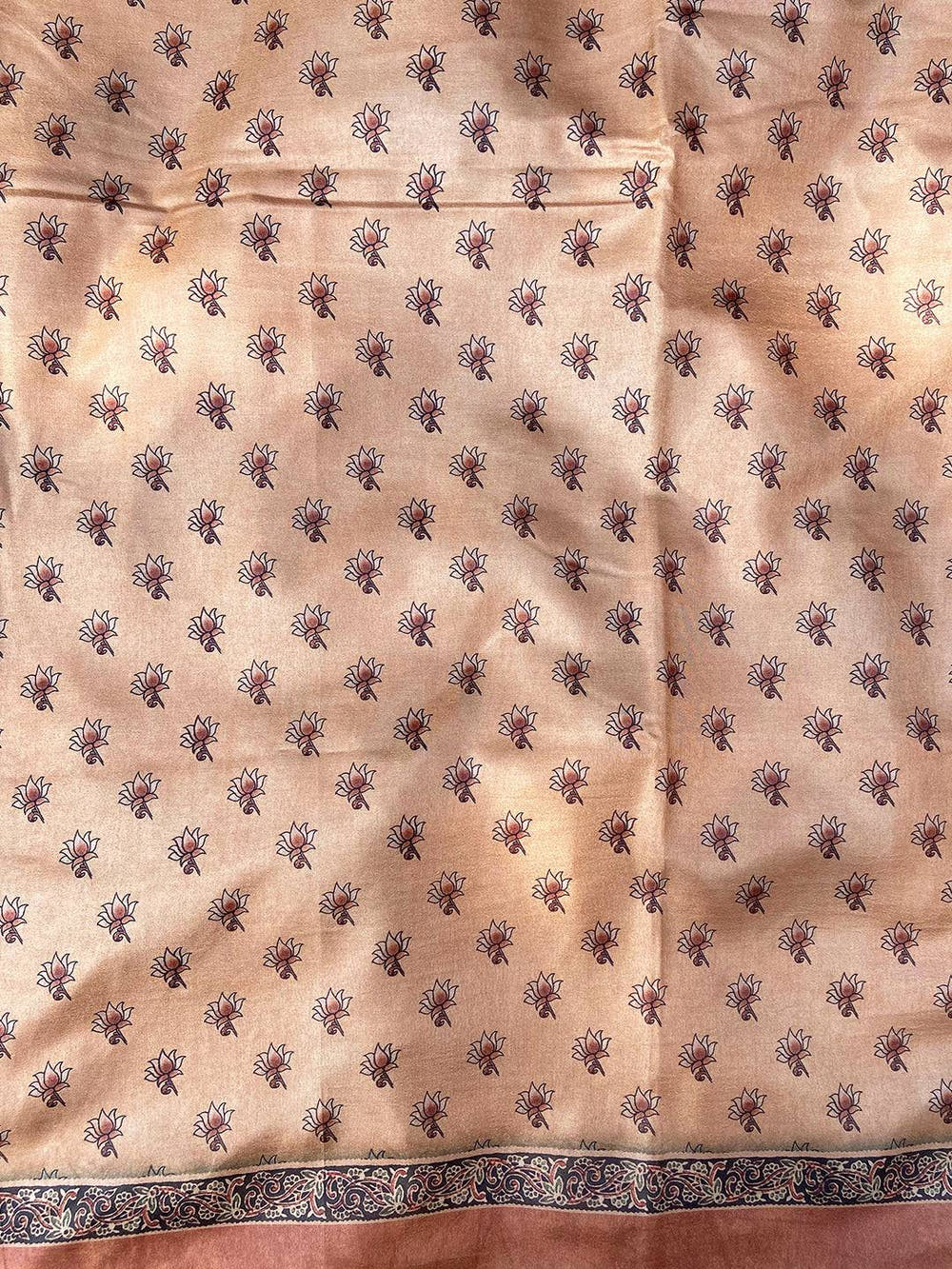 Tussar silk saree with intricate floral kalamkari motifs
