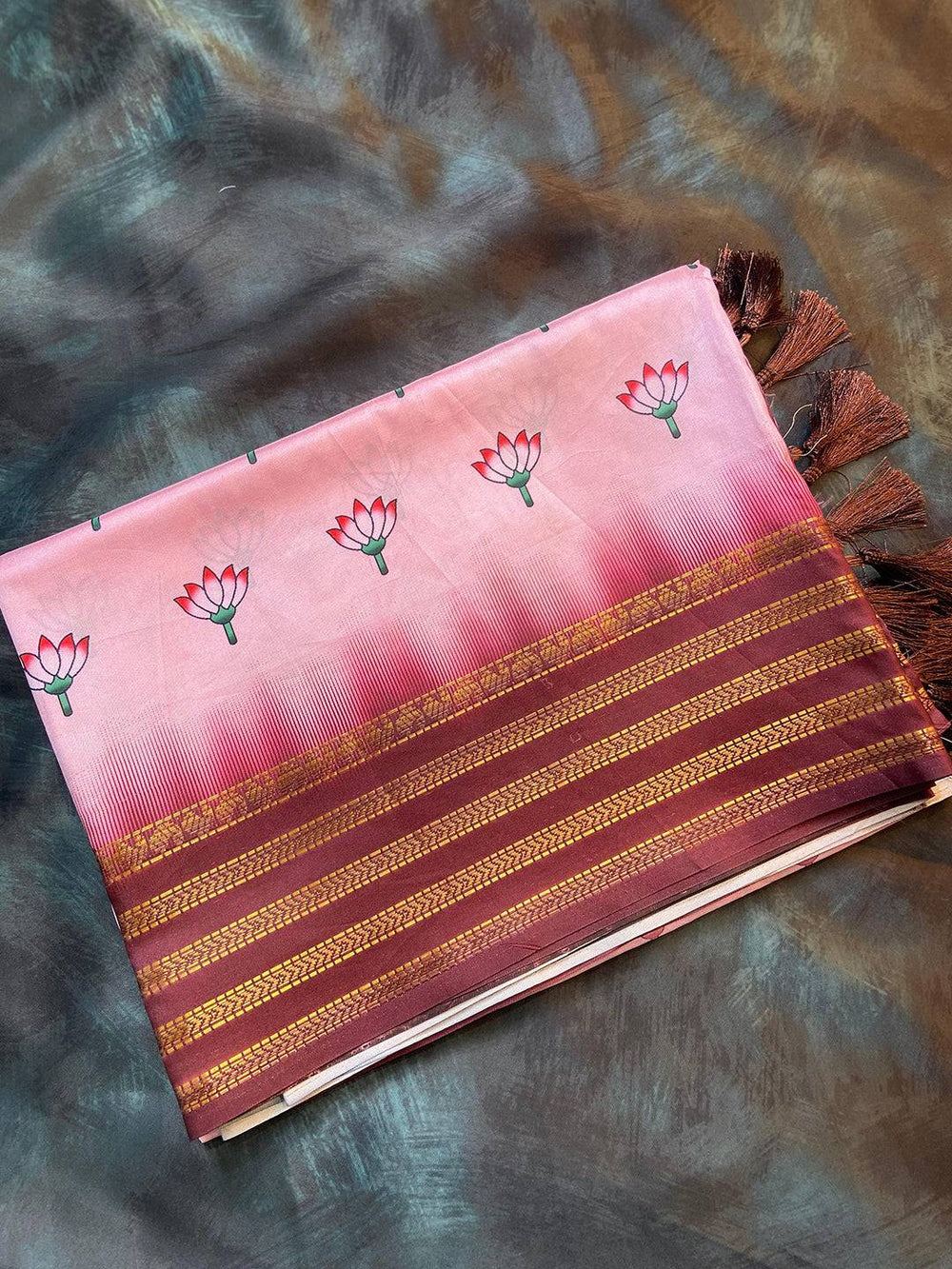 Folded Pink 2 Ton Lotus Print Silk Saree with tassels