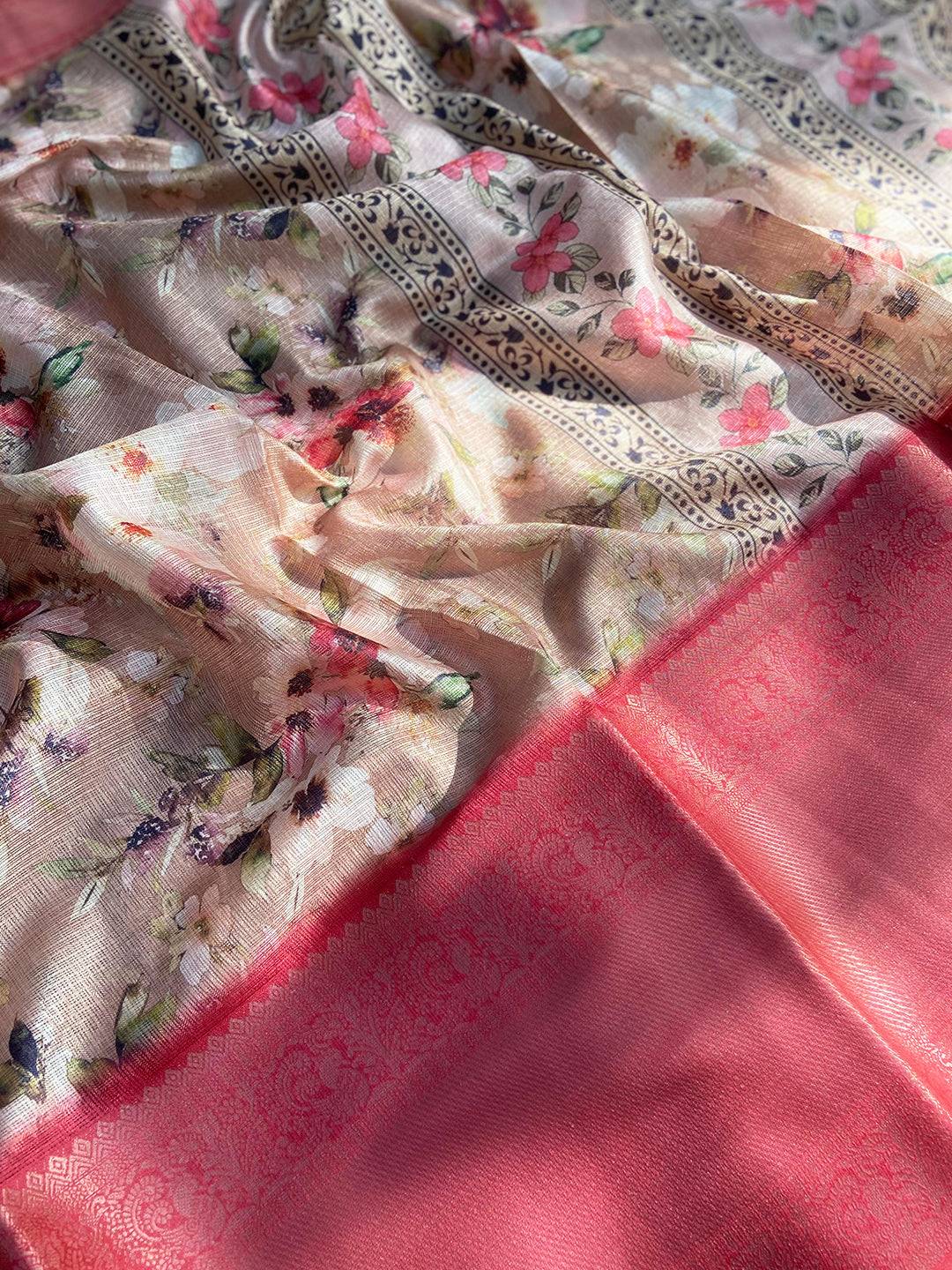 Detailed view of floral Kota Doriya saree with red border