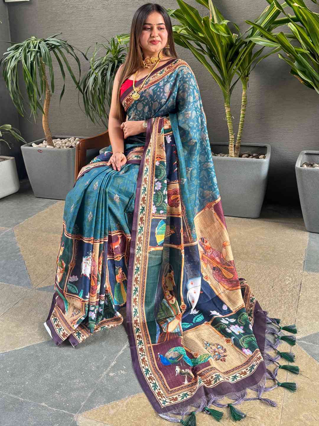 Firozi linen saree with digital print and majestic border