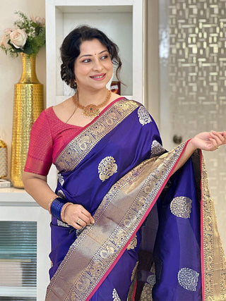 Purple Banarasi silk saree with Kanchi zari work, worn by a woman.Vastranand 