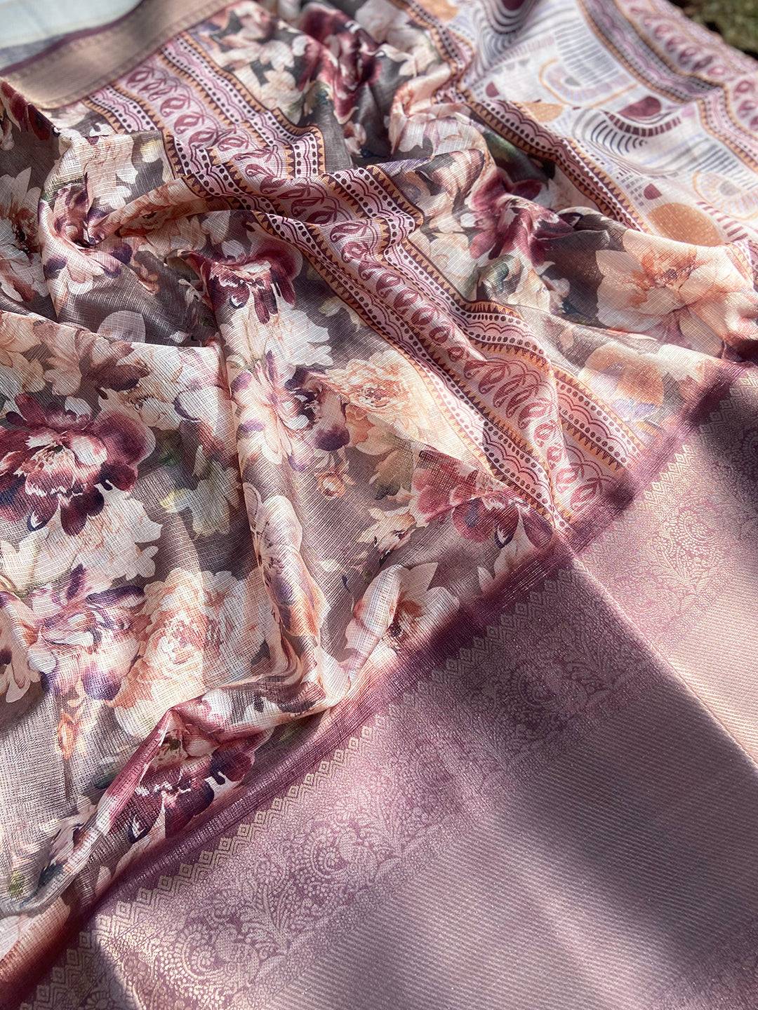 Close-up of Olive Kota Doriya saree with intricate floral pattern