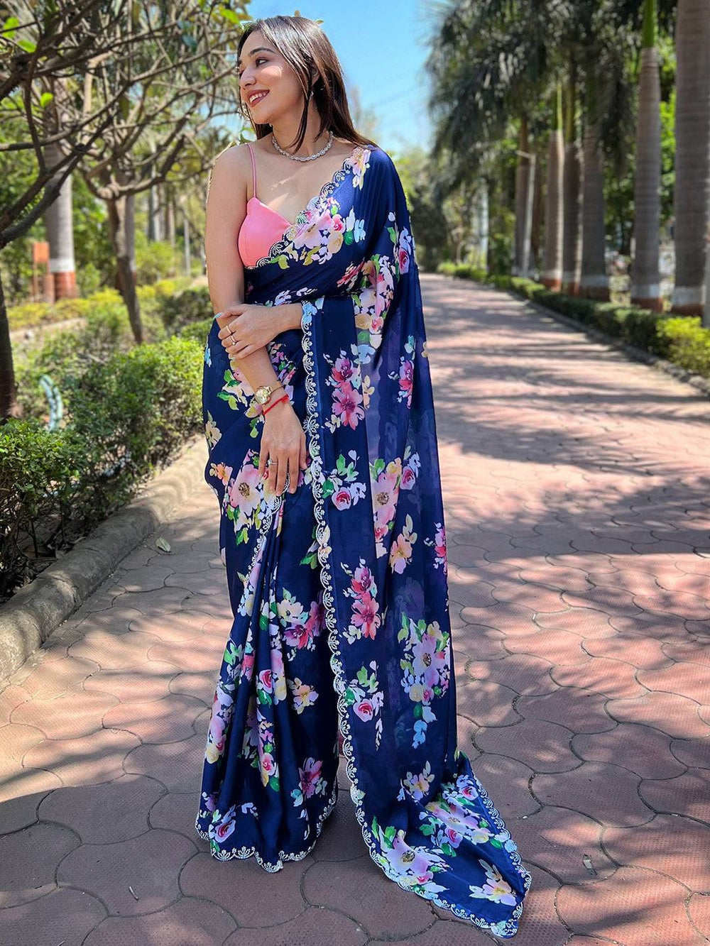 Elegant floral print saree in navy satin georgette