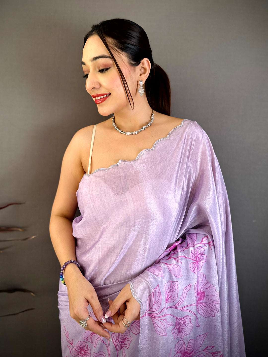 Lavender floral cutwork saree with chiffon fabric and pink floral print