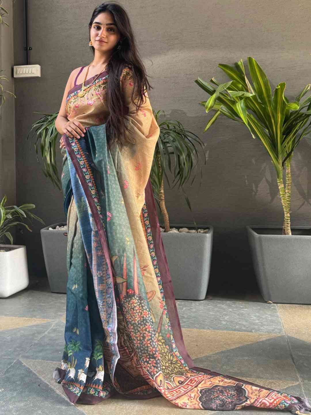 Elegant Turquoise Pichwai Print Saree with ombre effect.