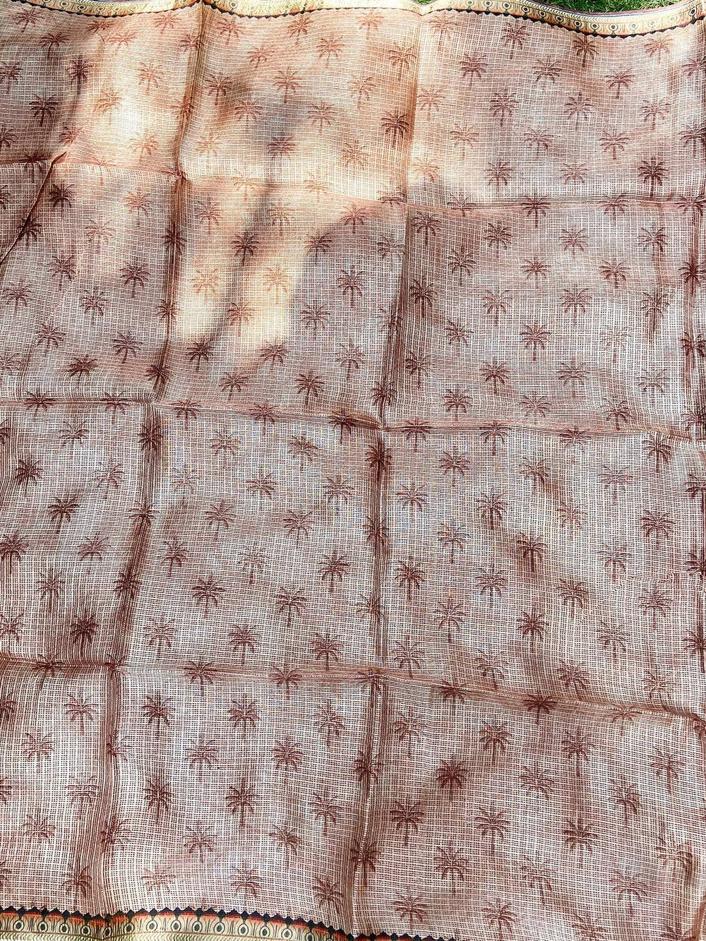 Reverse side of blue Kota Doriya silk saree with subtle palm prints.