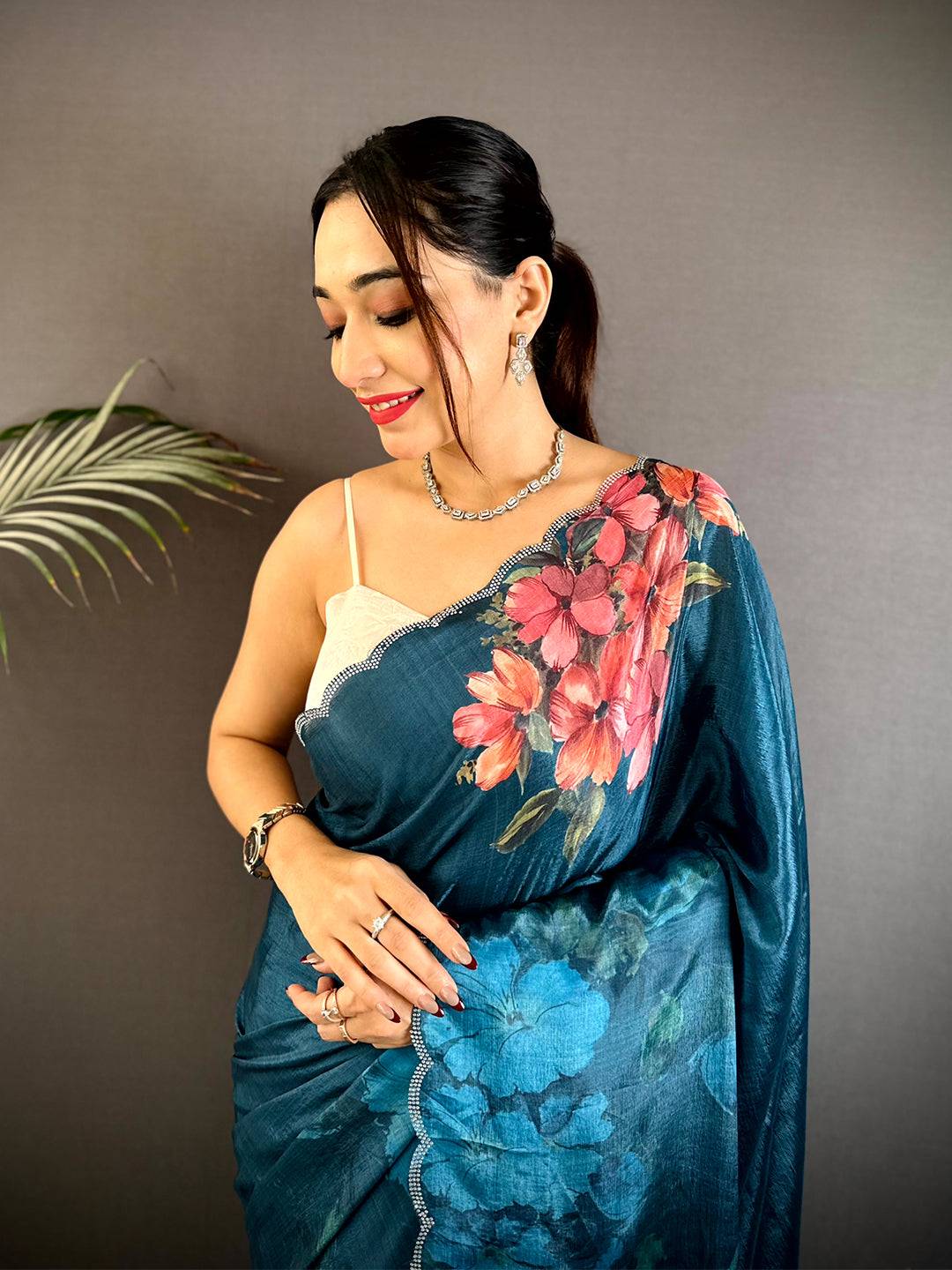 Teal Chinnon Stone Work Floral Saree
