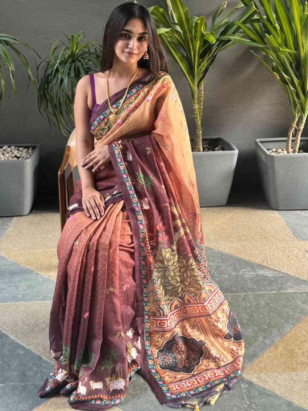Soft Linen Ombre Pichwai Wine Saree, seated view