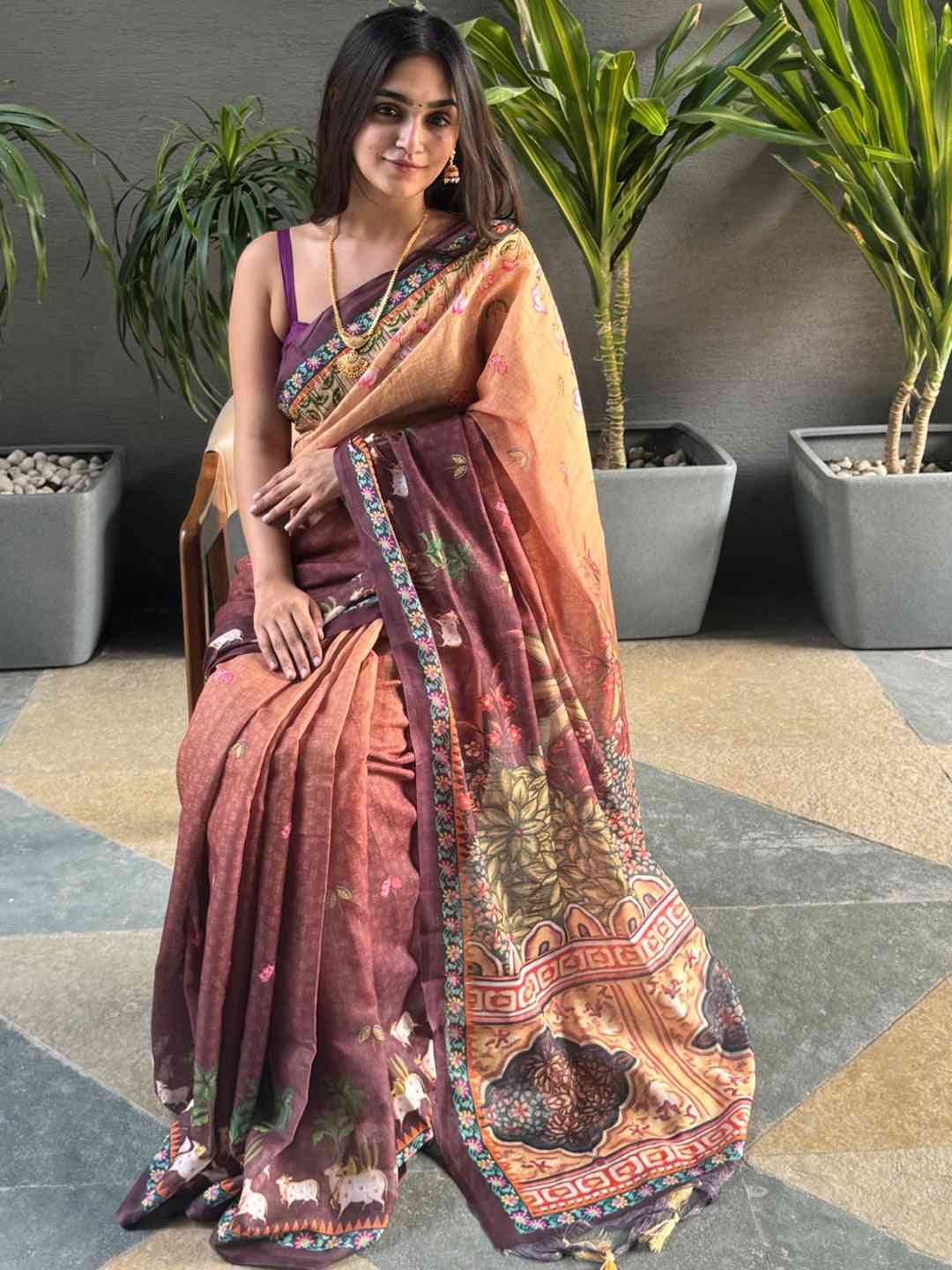 Soft Linen Ombre Pichwai Wine Saree, seated view