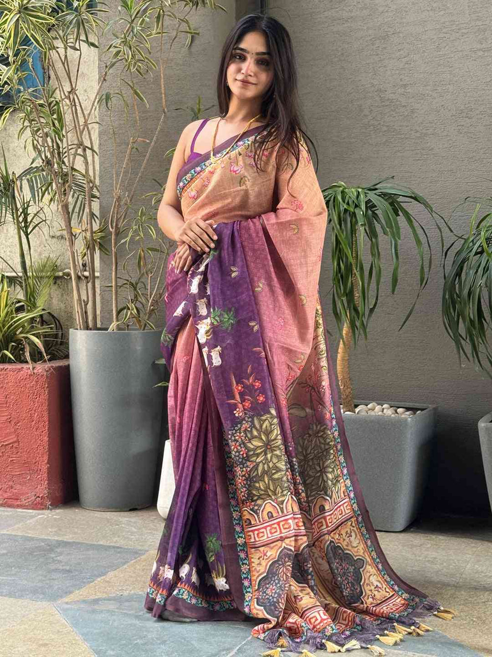Elegant purple ombre Pichwai saree with intricate patterns