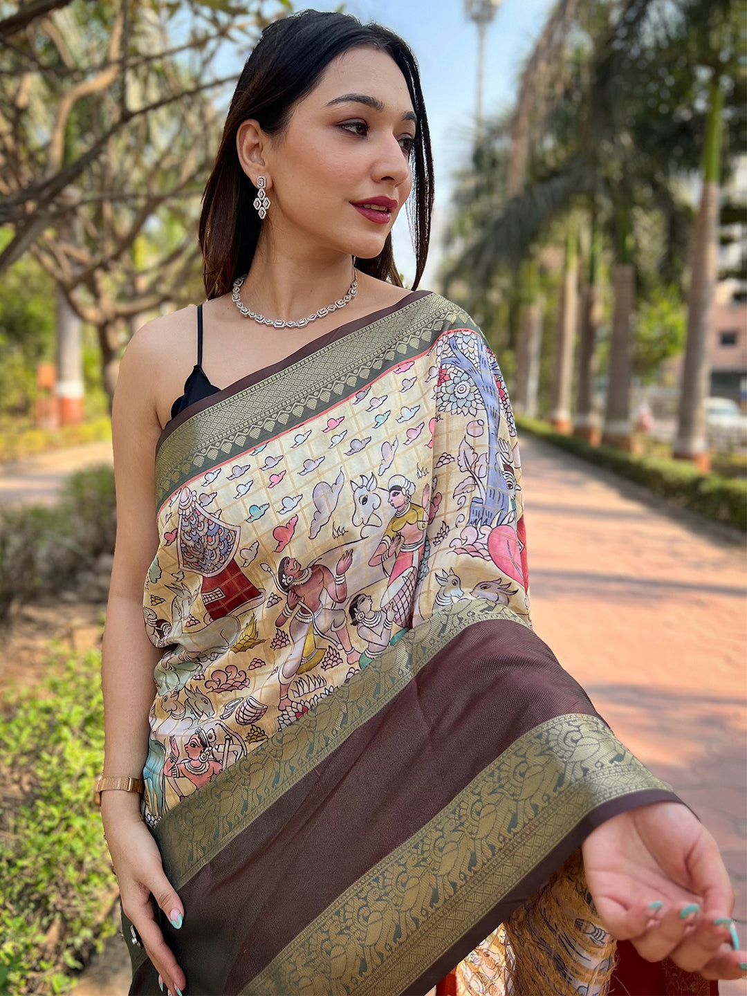 Elegant light green Banarasi saree with rich patterns and borders