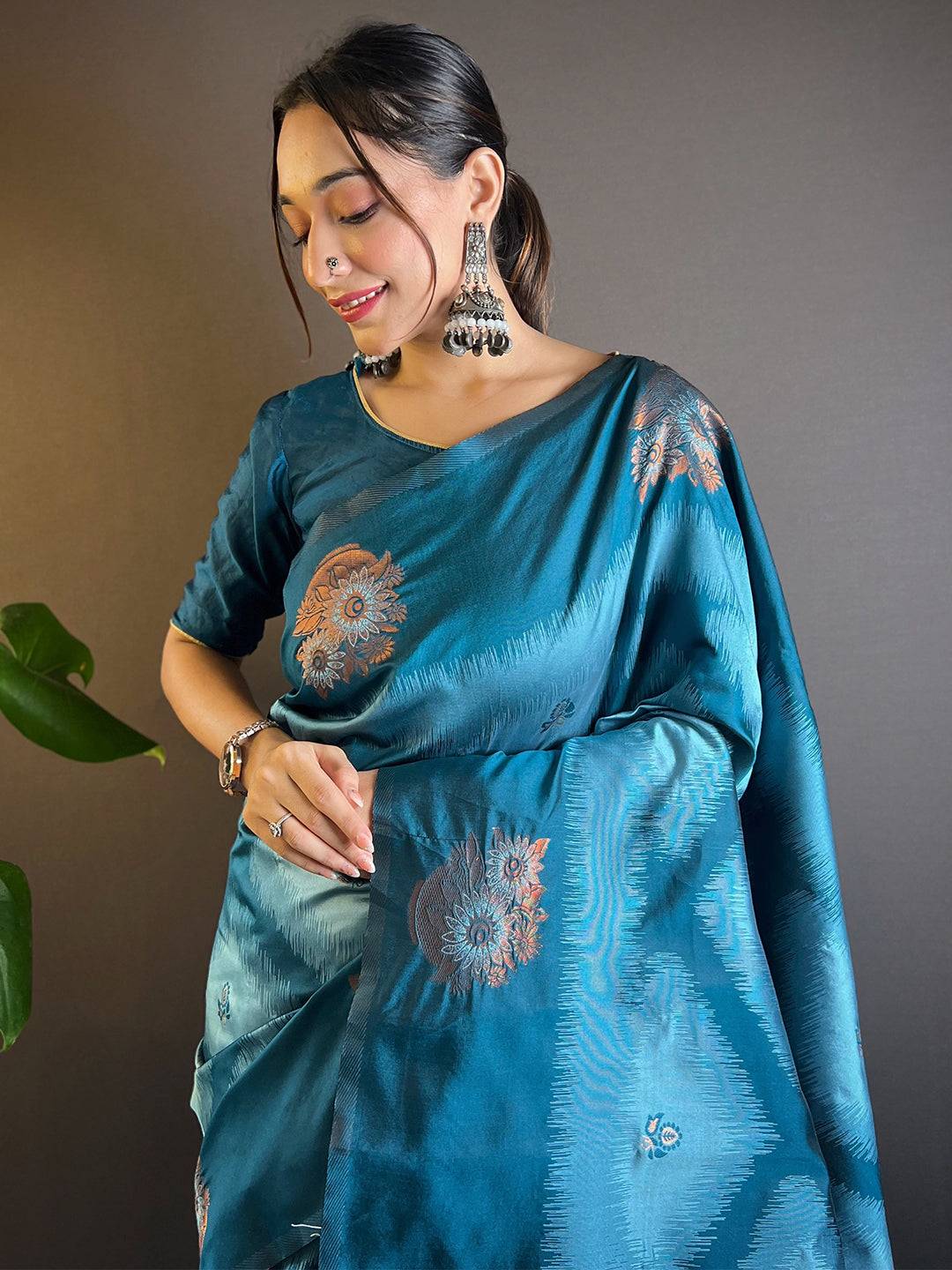 Model wearing blue Tussar silk Ikkat weaving saree