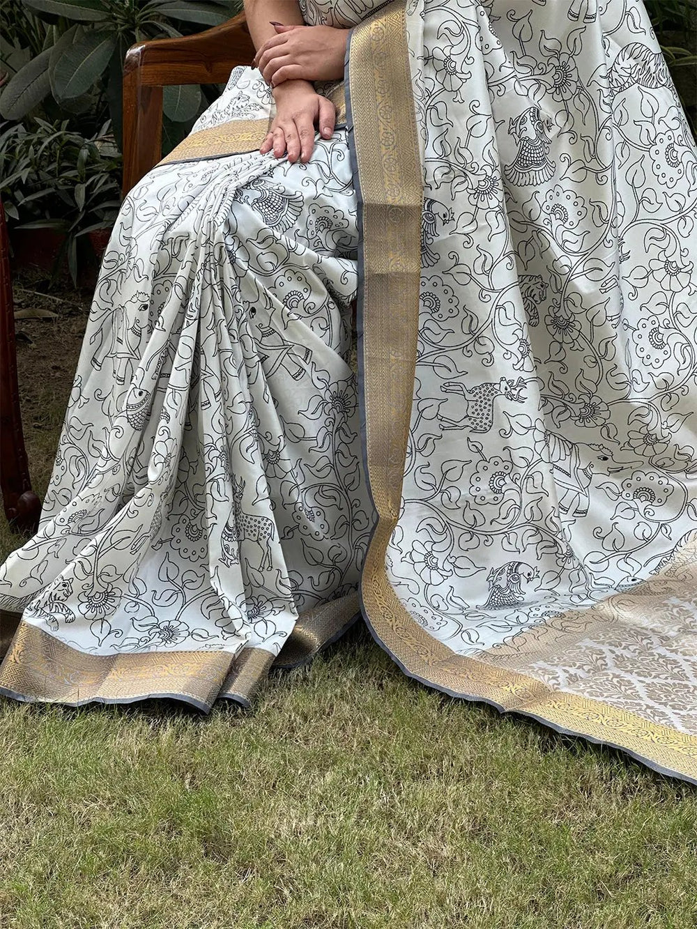 Close-up of Kalamkari saree with block print and zari details