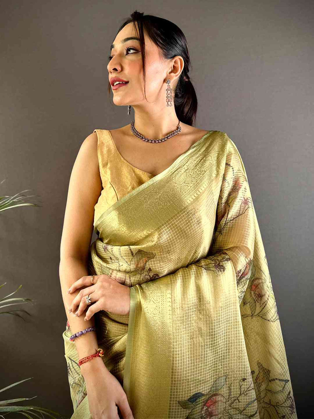 Stylish Olive Self Gold Zari Floral Print Saree