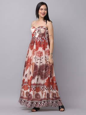 Model posing in blush cream floral print dress