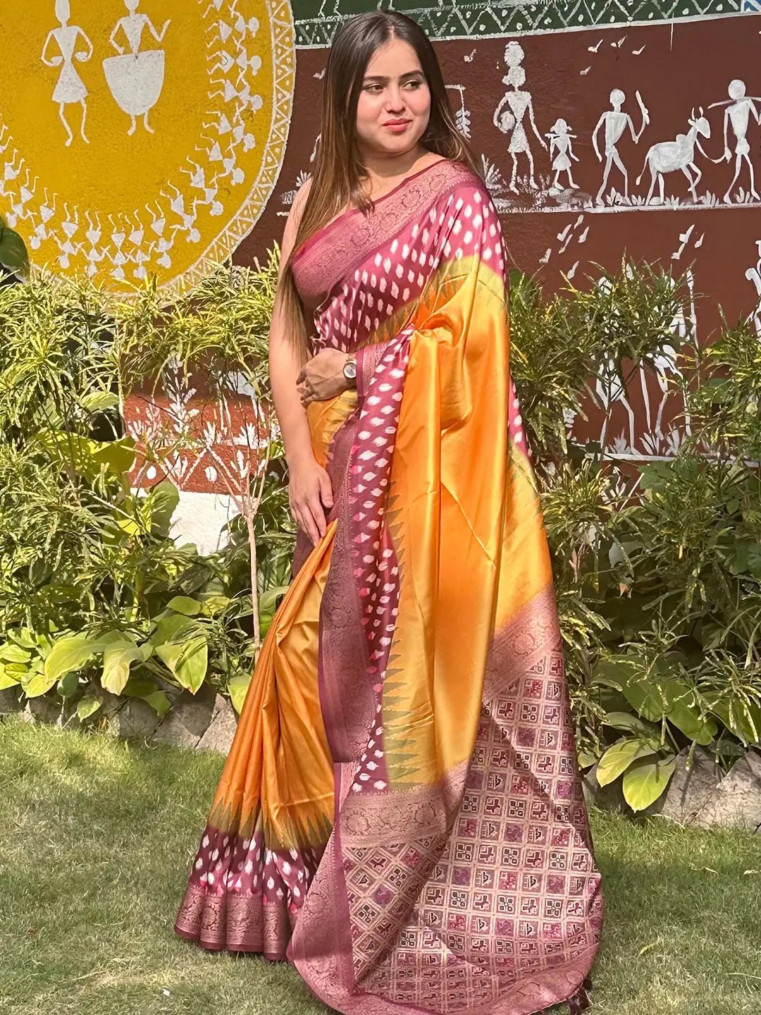 Model wearing Banarasi Soft Silk Saree with Patola Pallu in garden