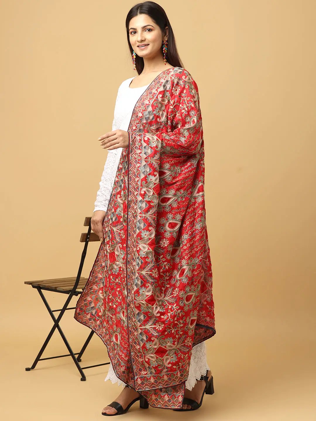 Model wearing red poly chiffon dupatta with threadwork