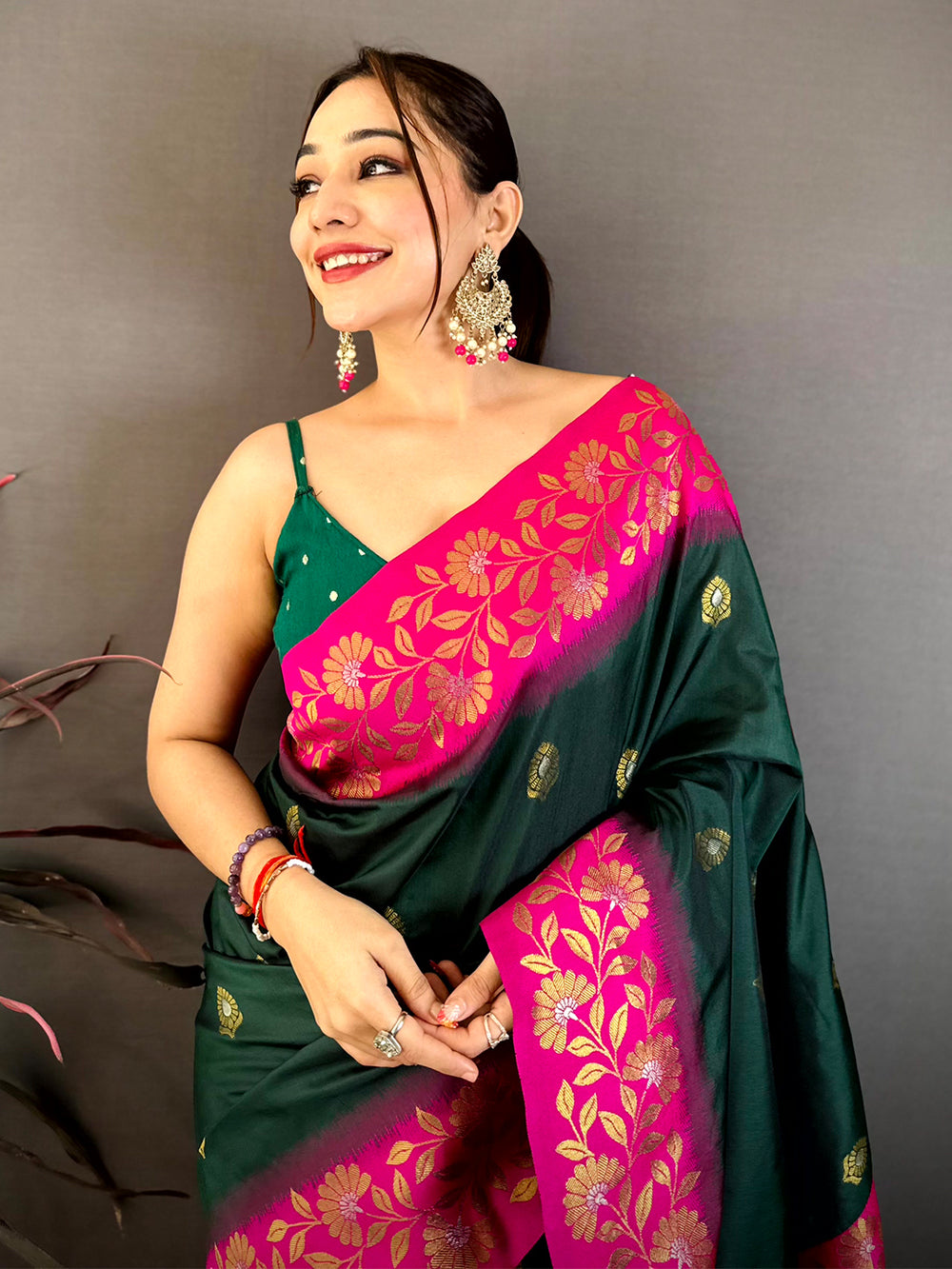 Deep Green Soft Silk Kanjivaram Saree with Pink and Gold Floral Design