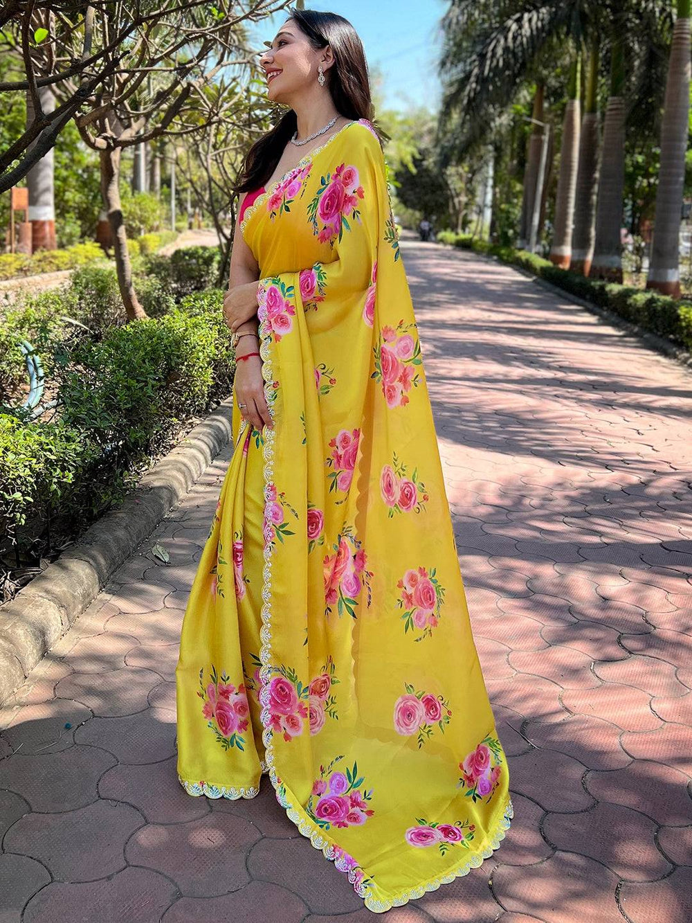Floral yellow saree with Swarovski zircon border