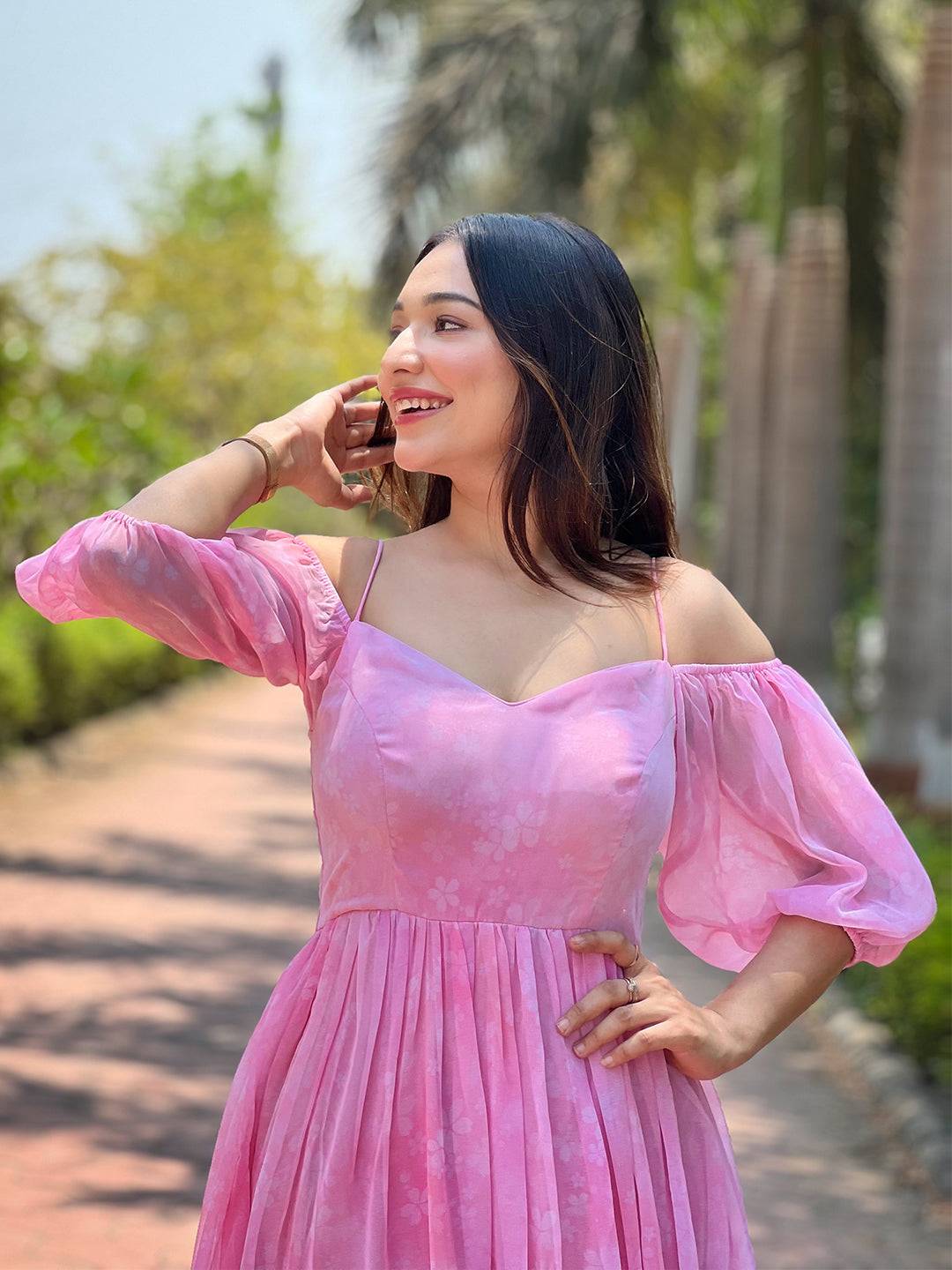 Close-up of rose pink floral dress with sweetheart neckline