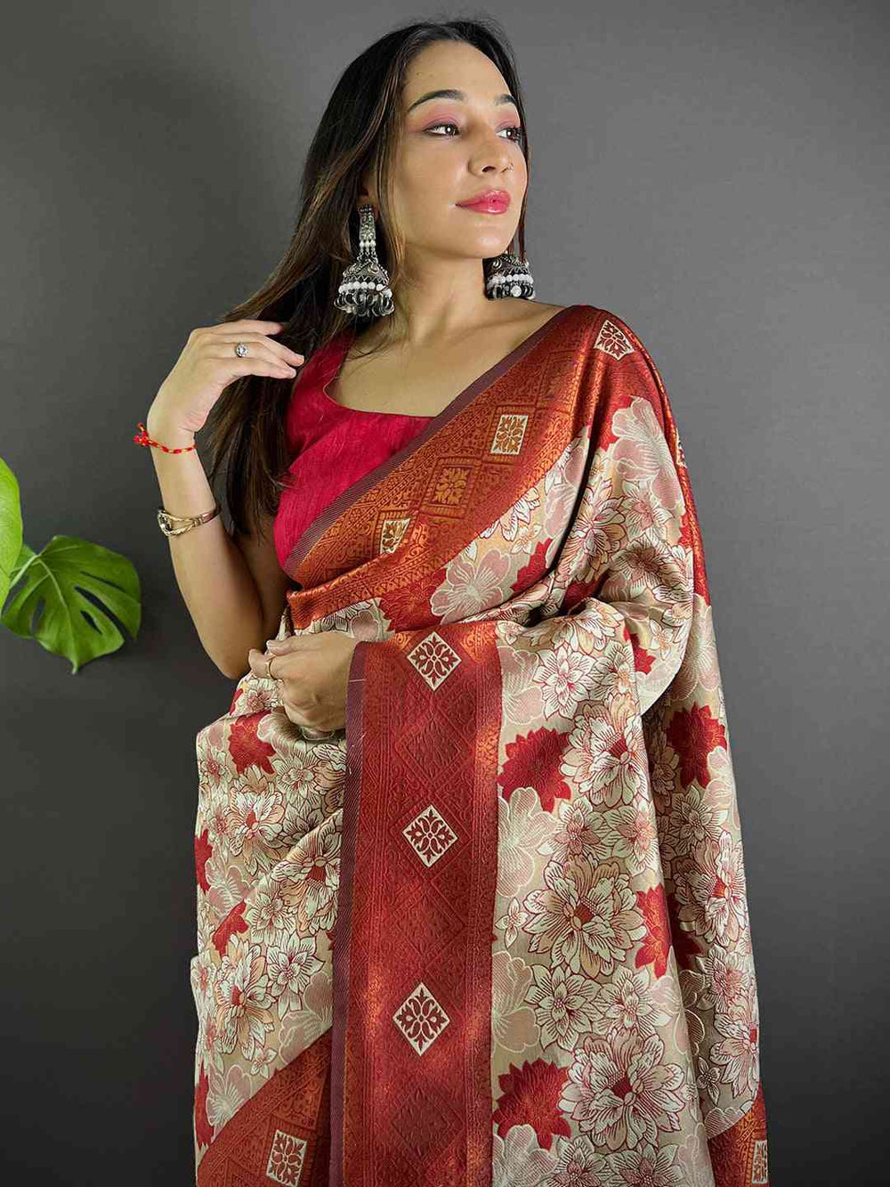 Oyster Cream Soft Silk Butta Weaving Saree draped elegantly.