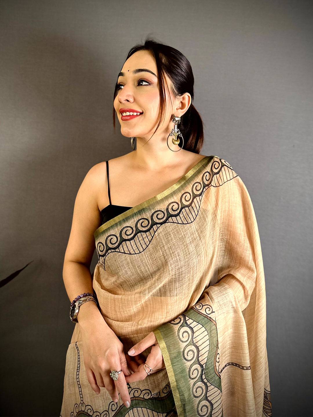 Elegant Freehand Kalamkari Linen Saree


