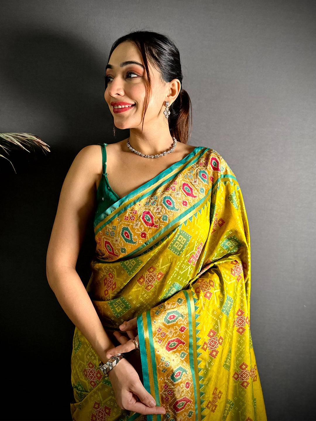 Green Soft Silk Saree With Patola Weaving

