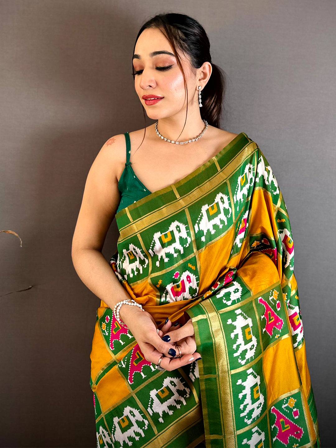 Elegant Yellow Green Ikkat Patola Silk Saree