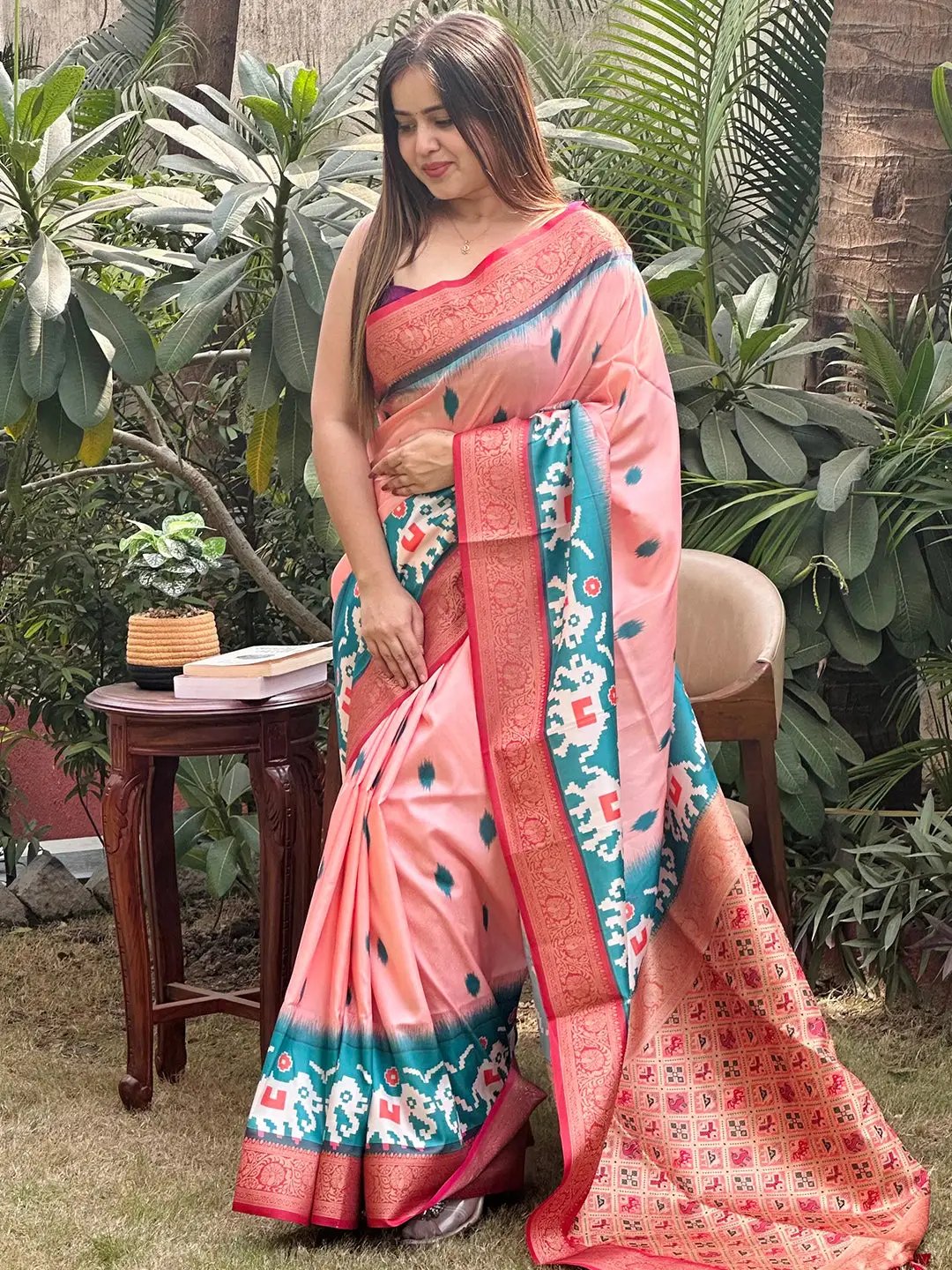 Traditional Banarasi saree featuring Zari Patola pallu design