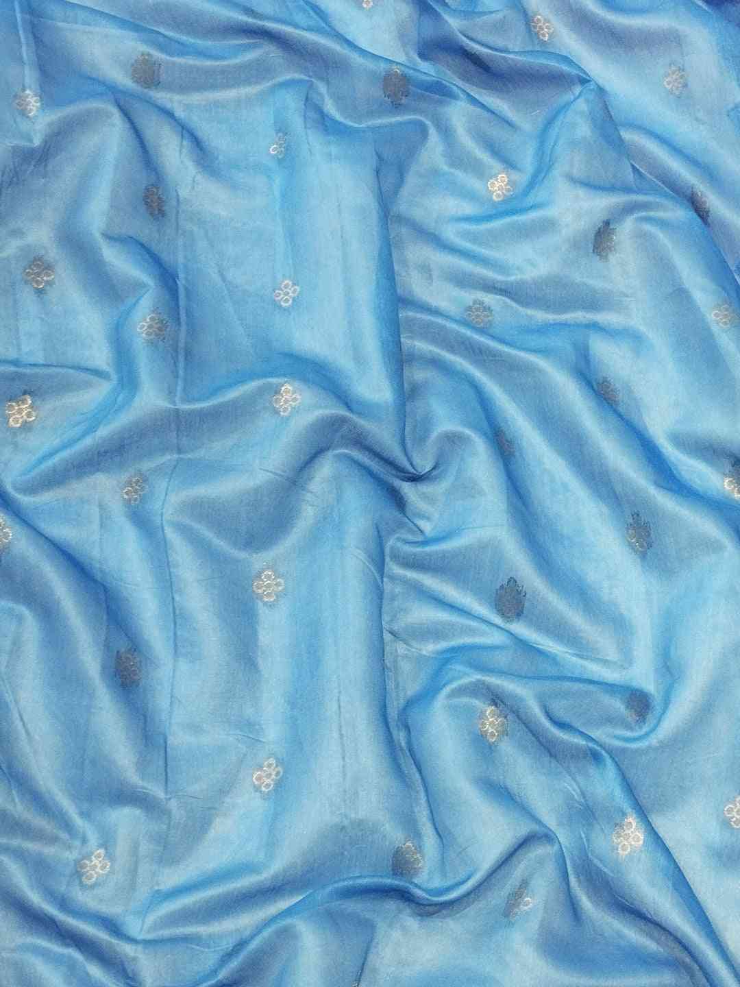 Blue slub silk fabric with delicate zari and Lakhnavi patterns
