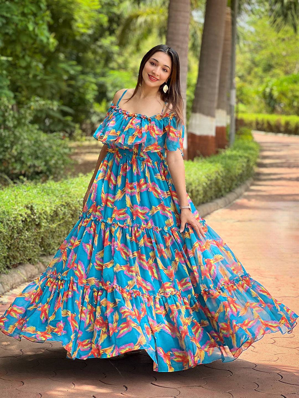 Off-shoulder ruffle neck blue maxi dress with vibrant design