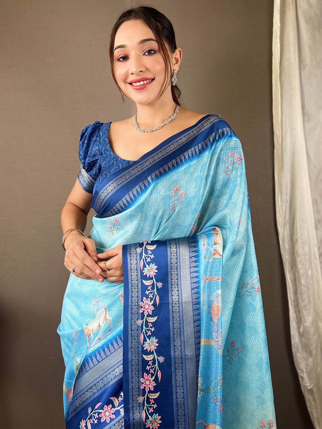 Close-up of Powder Blue Kota Saree with detailed satin border