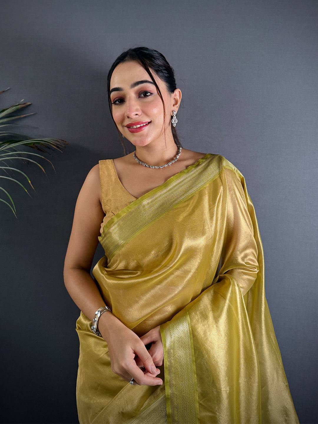 Radiant Green Gold Zari Tissue Saree

