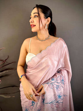 Pink floral cutwork saree with embroidery and scalloped border