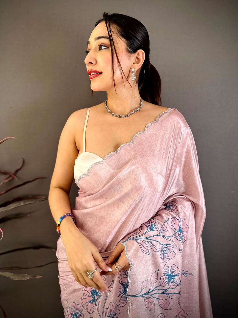 Pink floral cutwork saree with embroidery and scalloped border