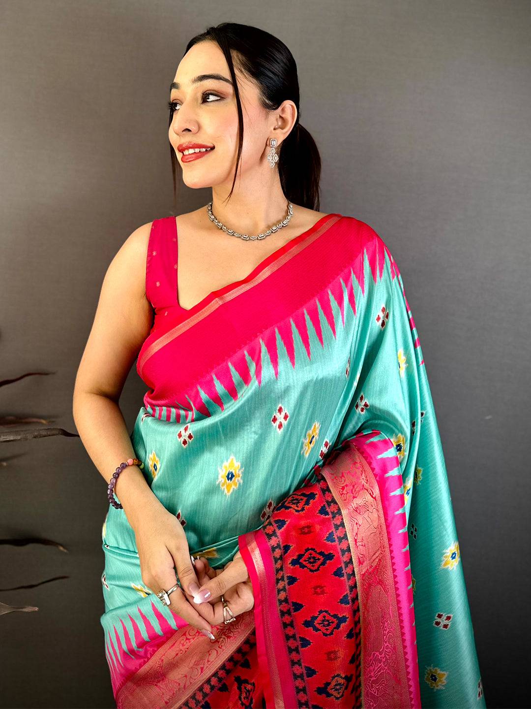 Aqua Contrast Satin Ikat Zari Silk Saree