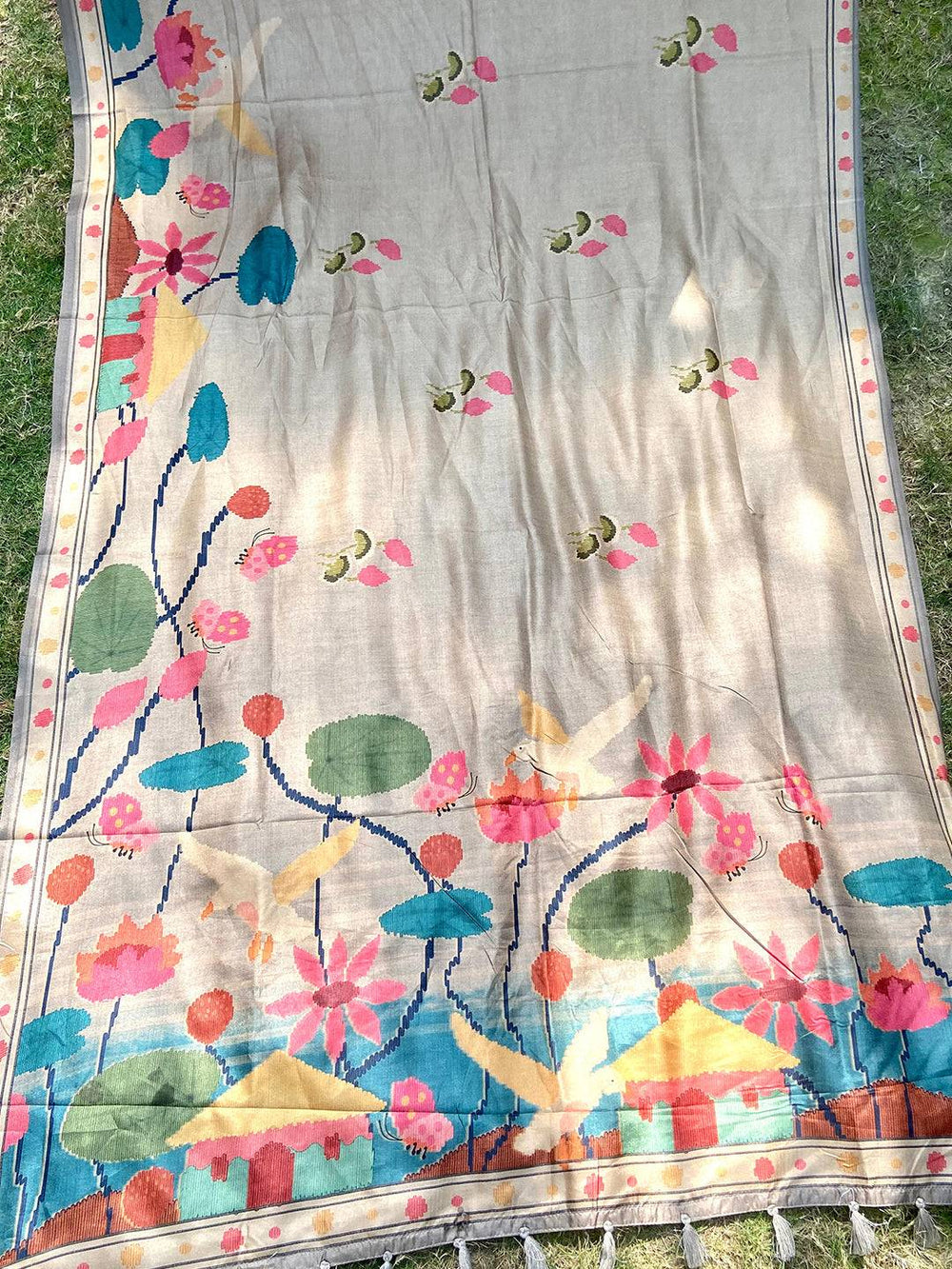 Full view of Grey Tussar Silk Saree with intricate Ikkat Kalamkari print