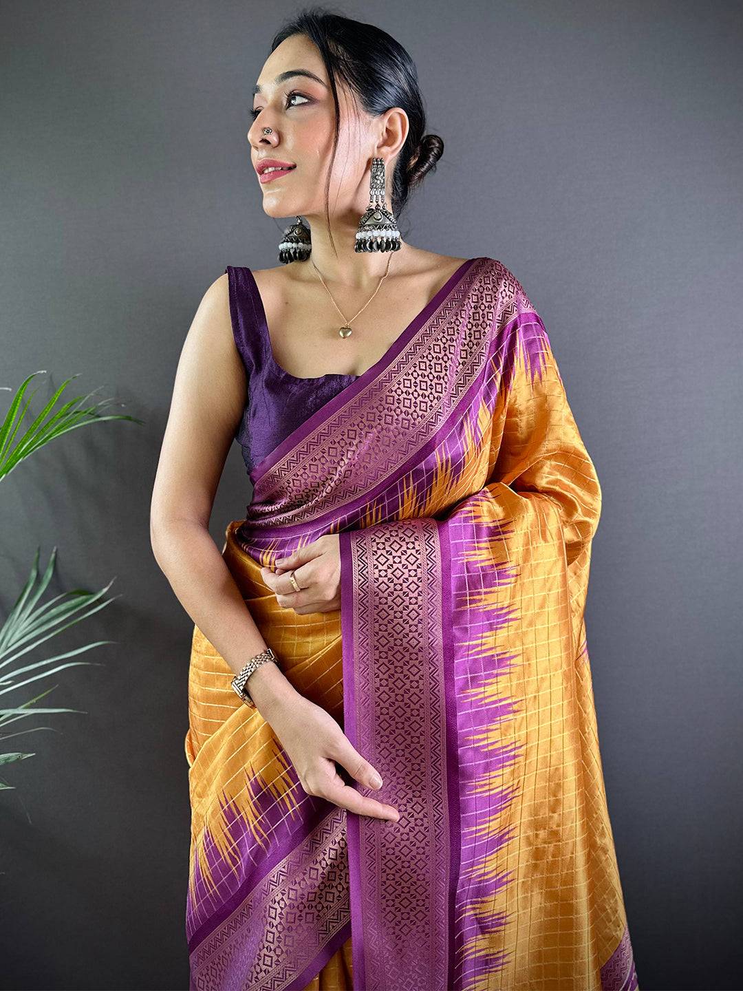 Close-up of Banarasi Silk Saree with purple and gold pattern
