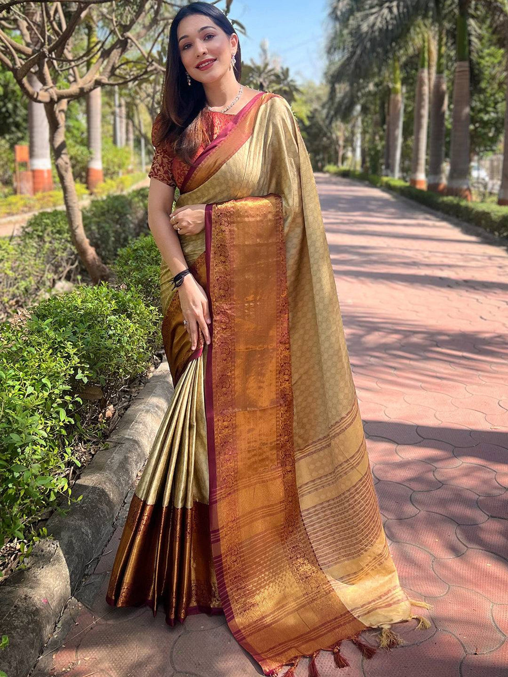 Elegant gold Kanjivaram saree with intricate zari work