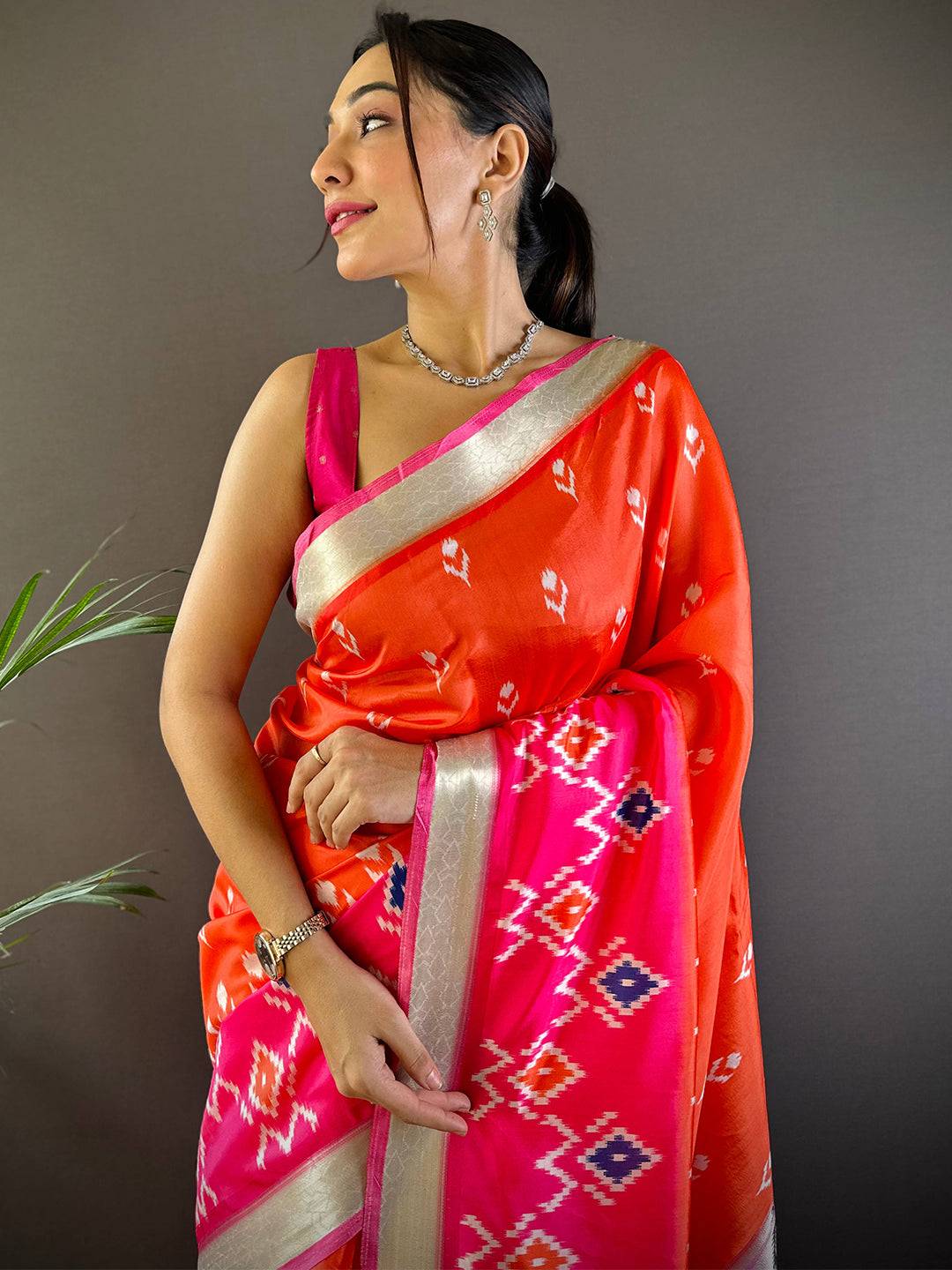 Orange Ikkat Paithani Soft Silk Saree with vibrant patterns