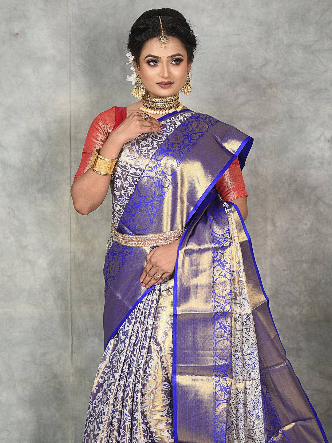 Stunning Royal Blue Silk Saree with gold tissue and silver patterns.