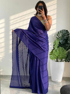 Blue georgette saree with detailed thread weaving pattern