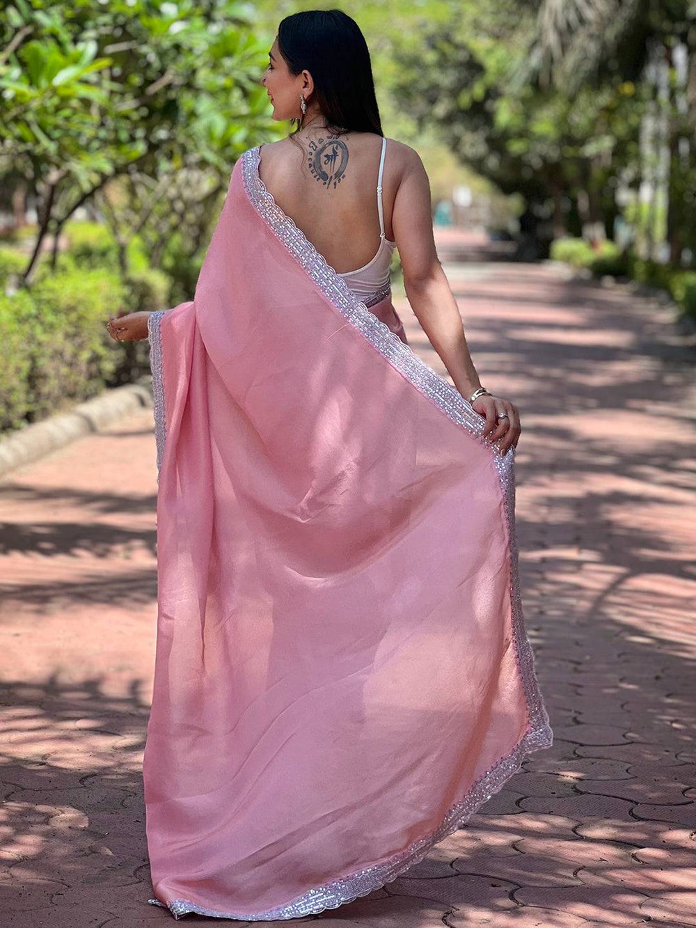 Back view of pink viscose saree with intricate border