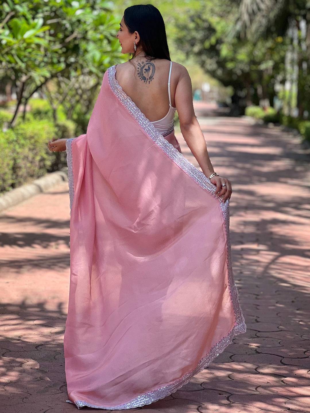 Back view of pink viscose saree with intricate border